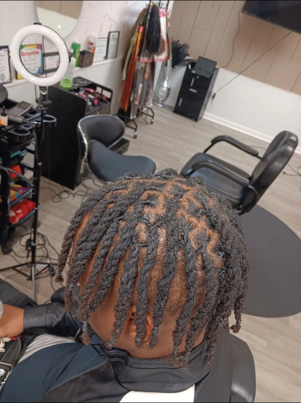 Loc retwist detail created by Elegant African Braiding