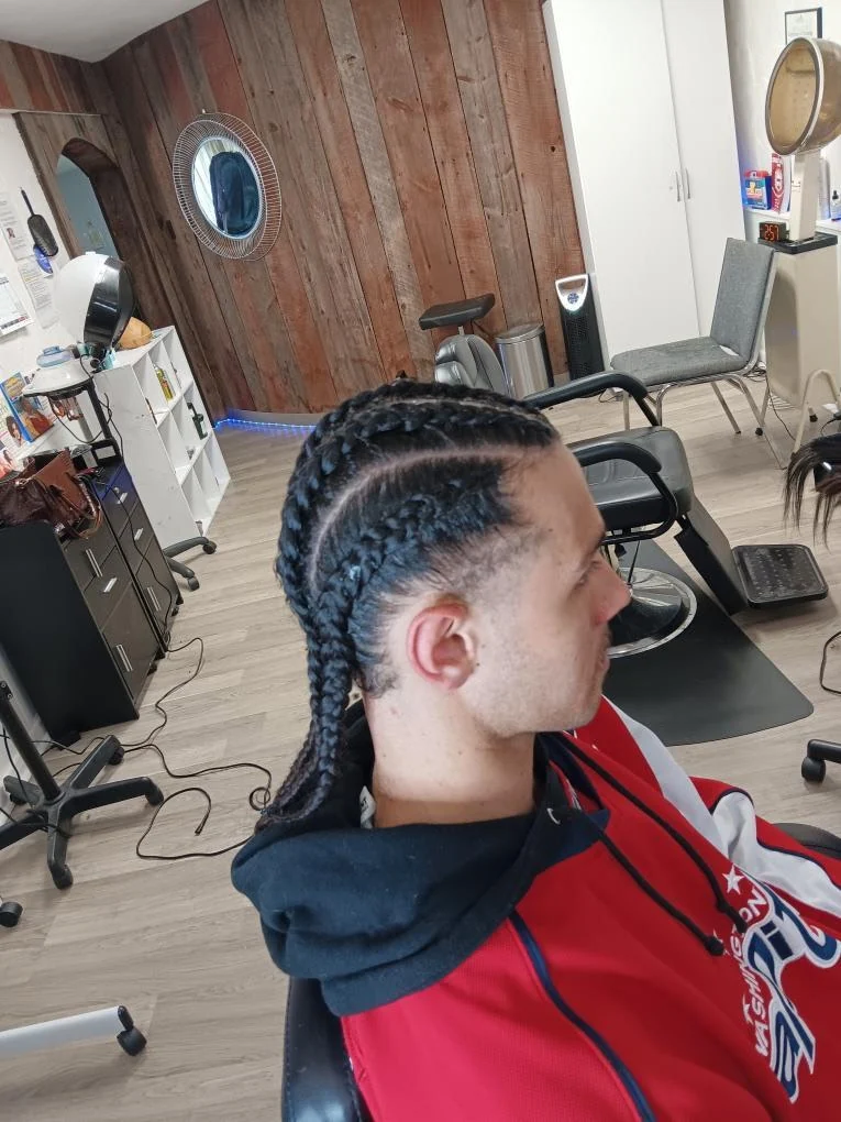 Straight-back cornrows for men created by Elegant African Braiding